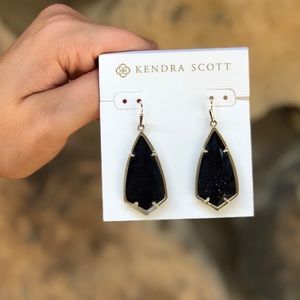 Blue glistening Kendra Scott earrings